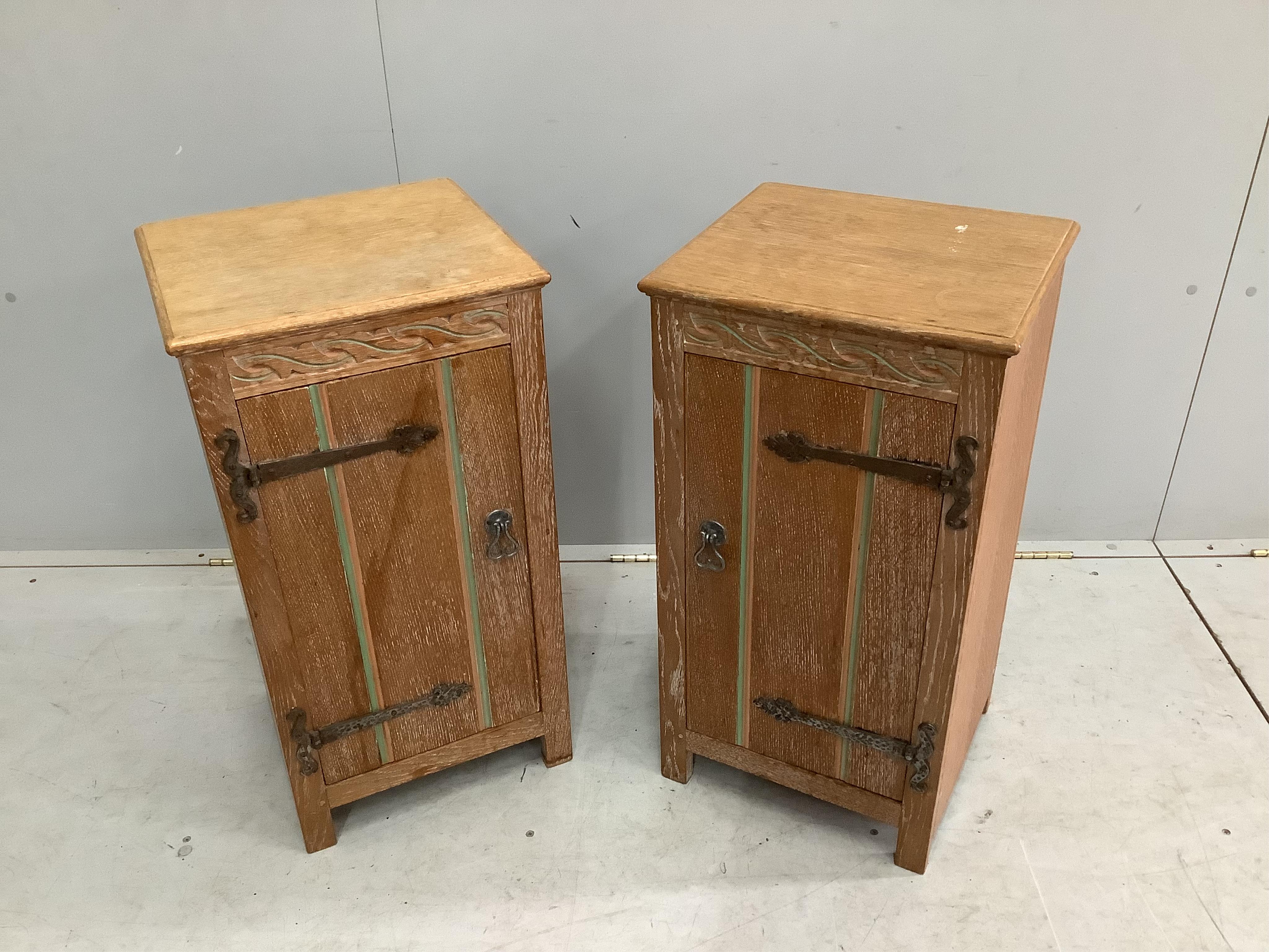 A painted limed oak eight piece bedroom suite, comprising a pair of three drawer chests, pair of bedside cabinets, dressing table stool, wardrobe and headboard. Condition - fair